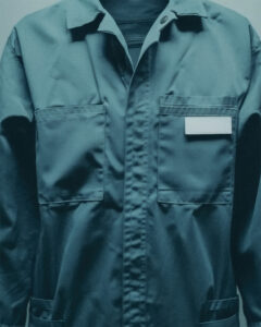 closeup-view-plain-blue-work-coverall-with-blank-name-tag-pocket copy